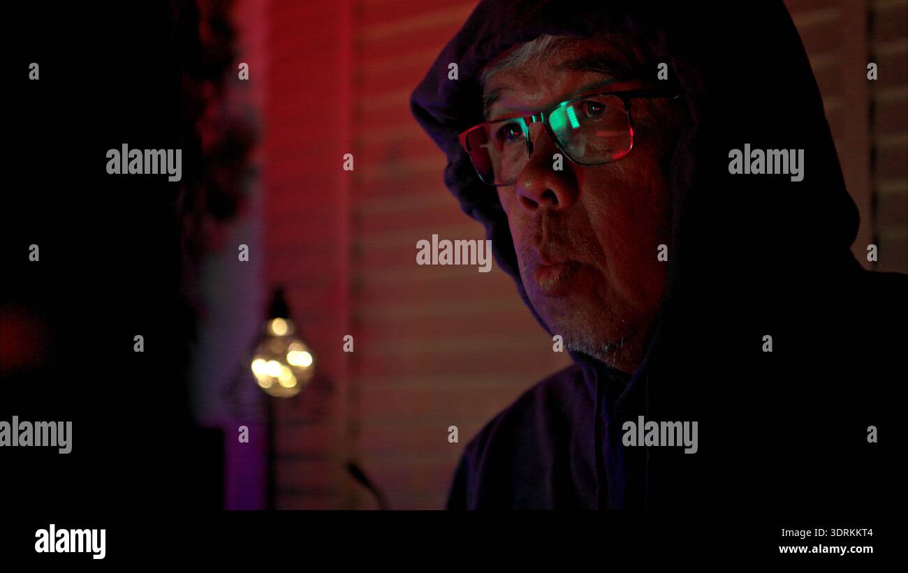 An expert hacker is decrypting data Stock Photo