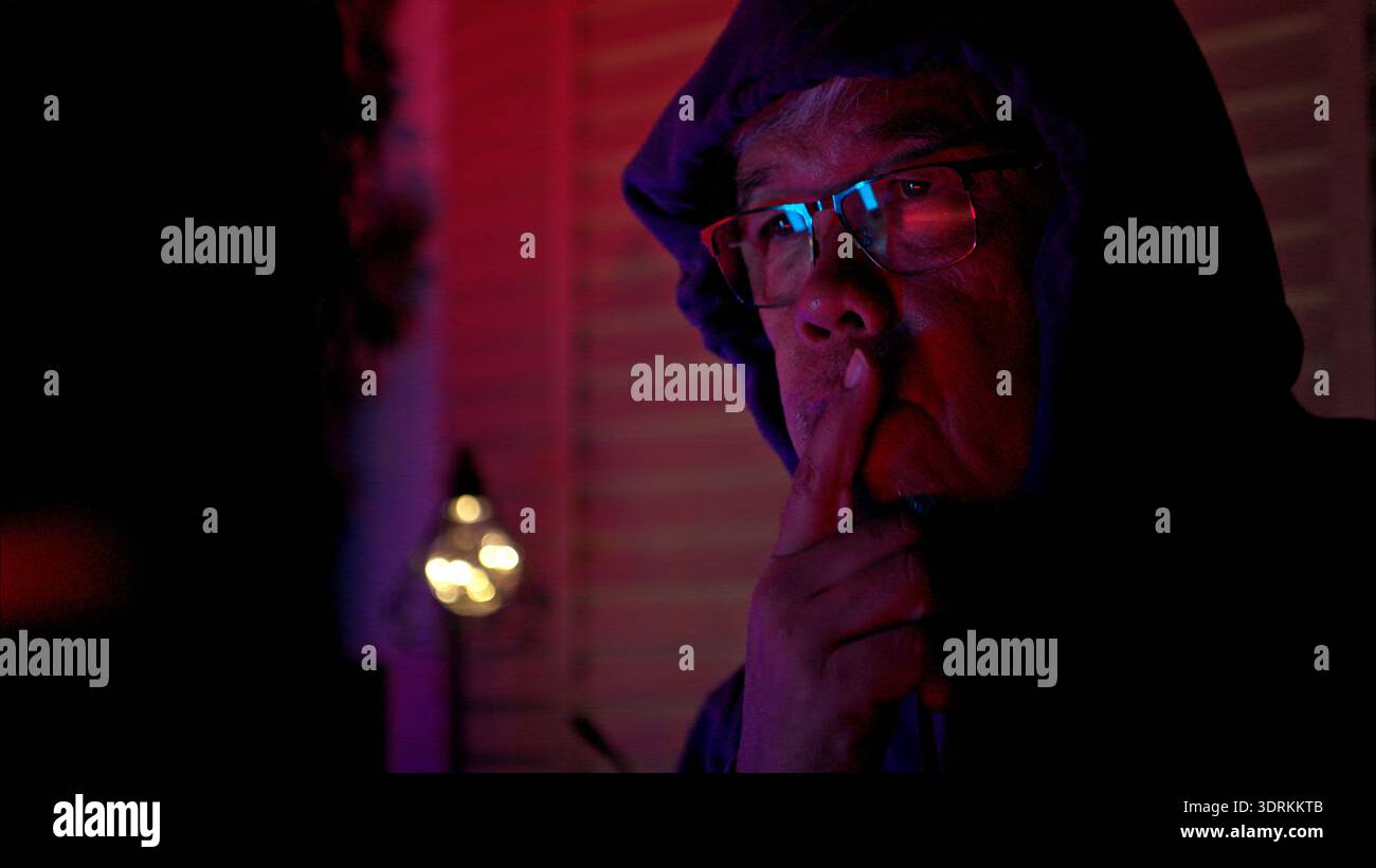 An expert hacker is decrypting data Stock Photo