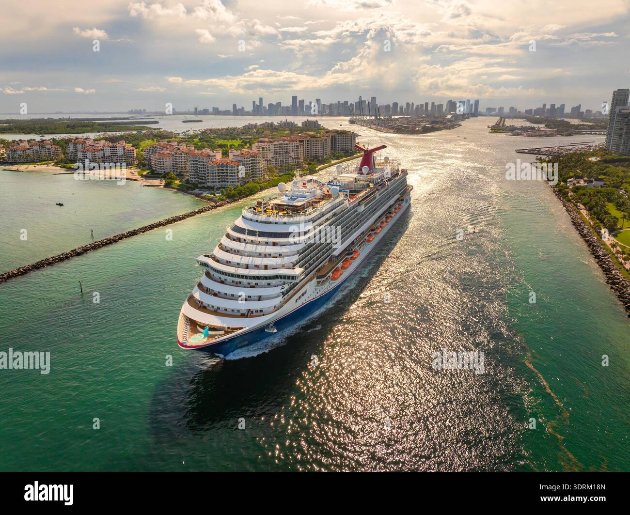 Aerial panorama of Miami, Florida with luxury cruise liner sailing