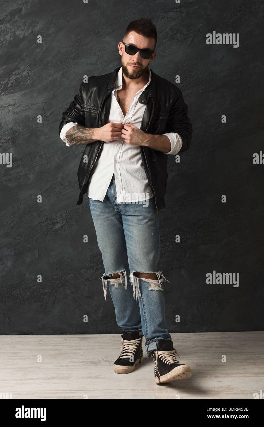 Man wearing jeans sneakers hi-res stock photography and images - Alamy