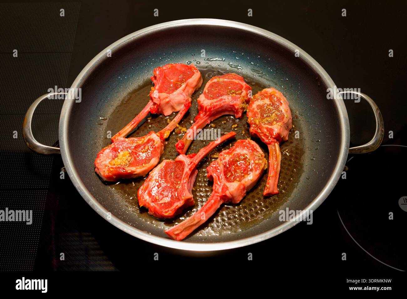 Rack of lamb in a pan Stock Photo
