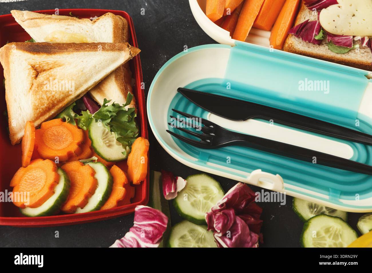 Collage of Healthy Lunch Ideas in Different Containers on a Table Stock Photo