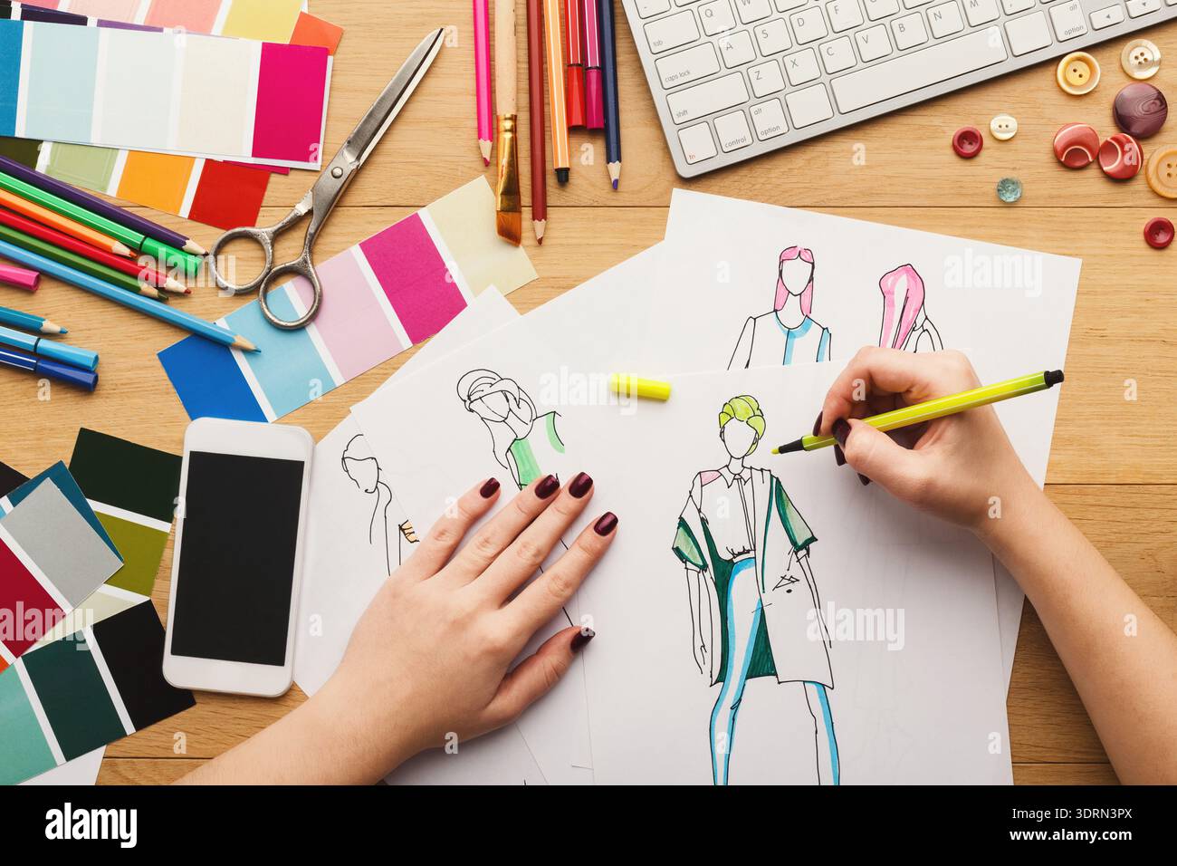 Creative Process in Design Workshop With Sketches, Tools, and Colors on Table Stock Photo