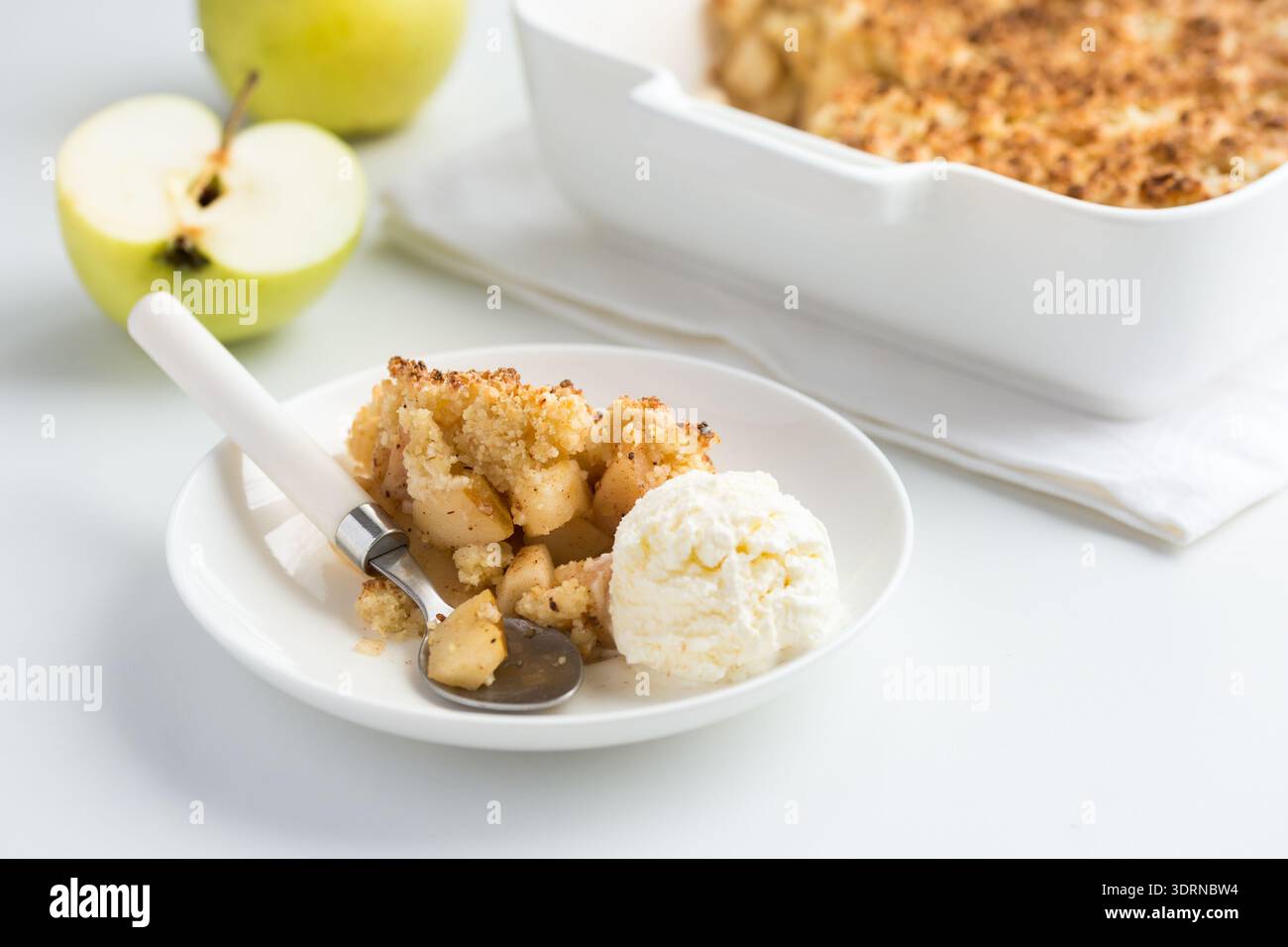 Apple crumble pie and vanilla ice cream Stock Photo