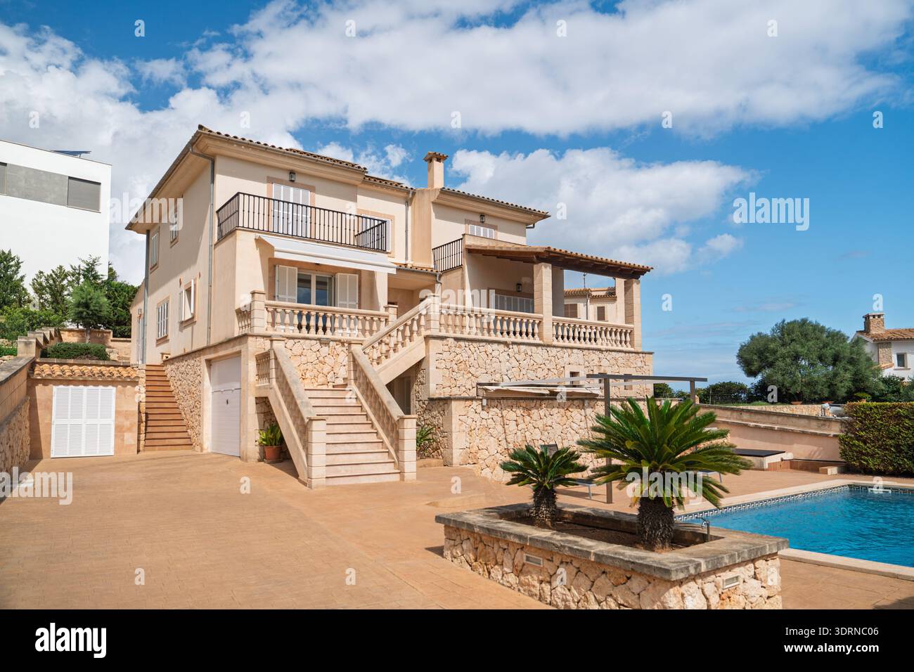 Luxury Villa with Pool and Stone Accents in Beautiful Mallorica, Spain A Vacation Home Retreat Stock Photo