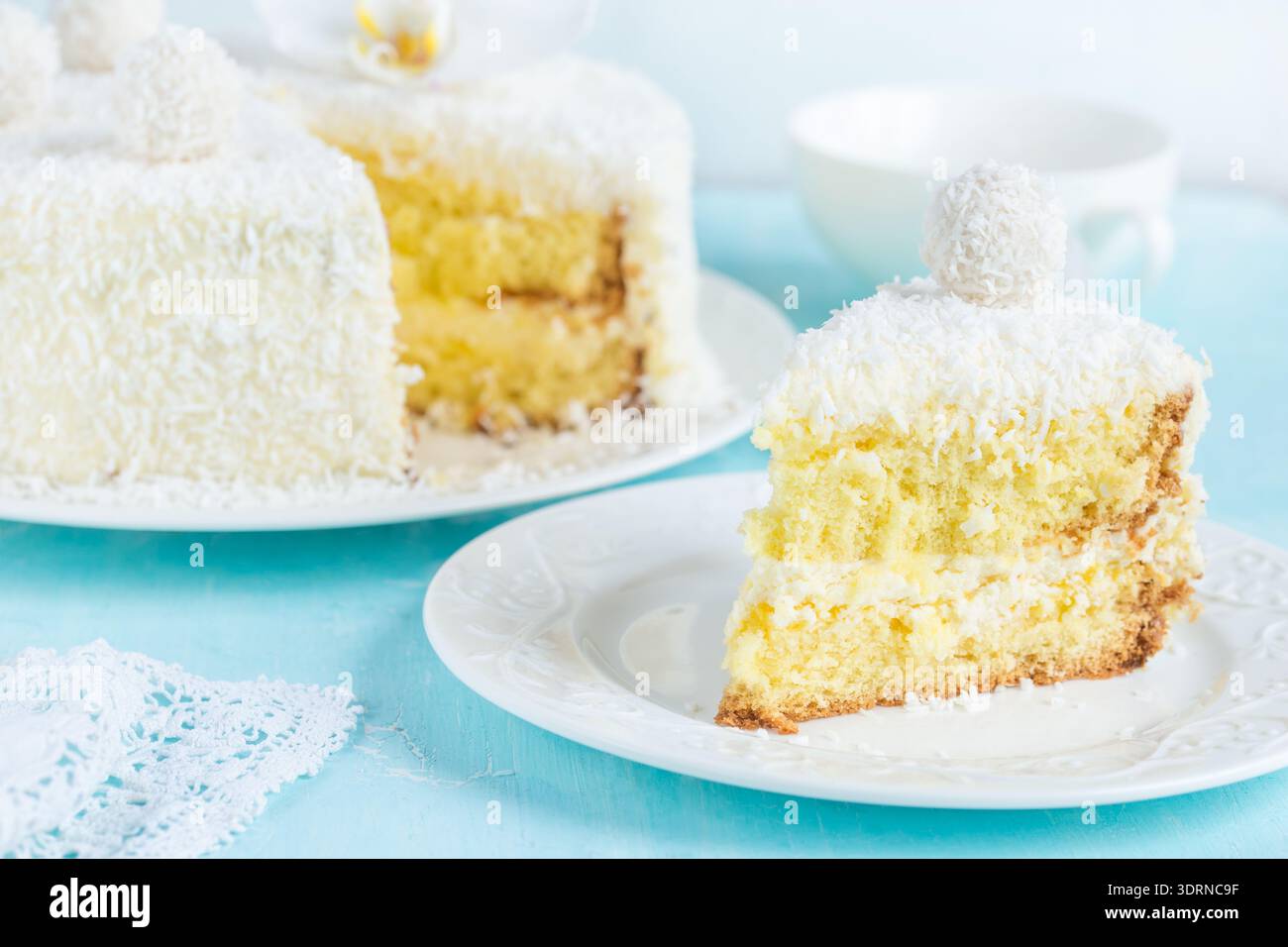 Festive lemon and coconut sponge cake Stock Photo