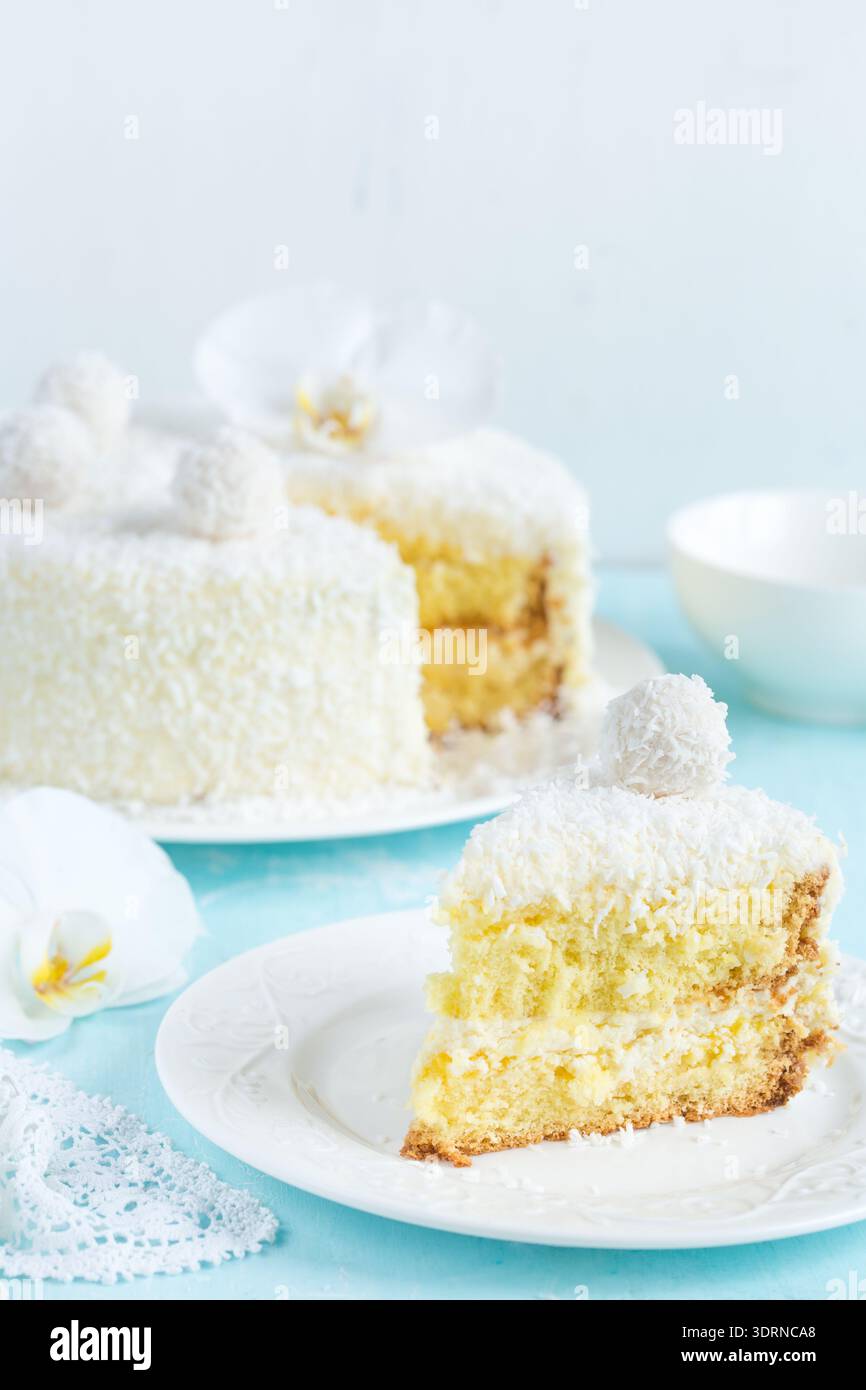 Festive lemon and coconut sponge cake Stock Photo