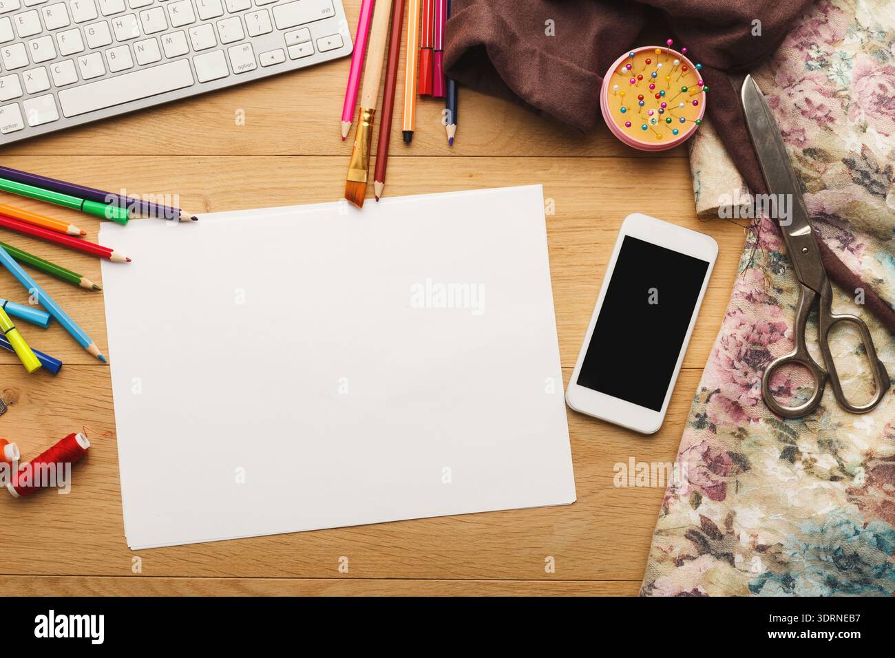 Creative Workspace Arrangement With Materials for Crafting and Design Activities Stock Photo