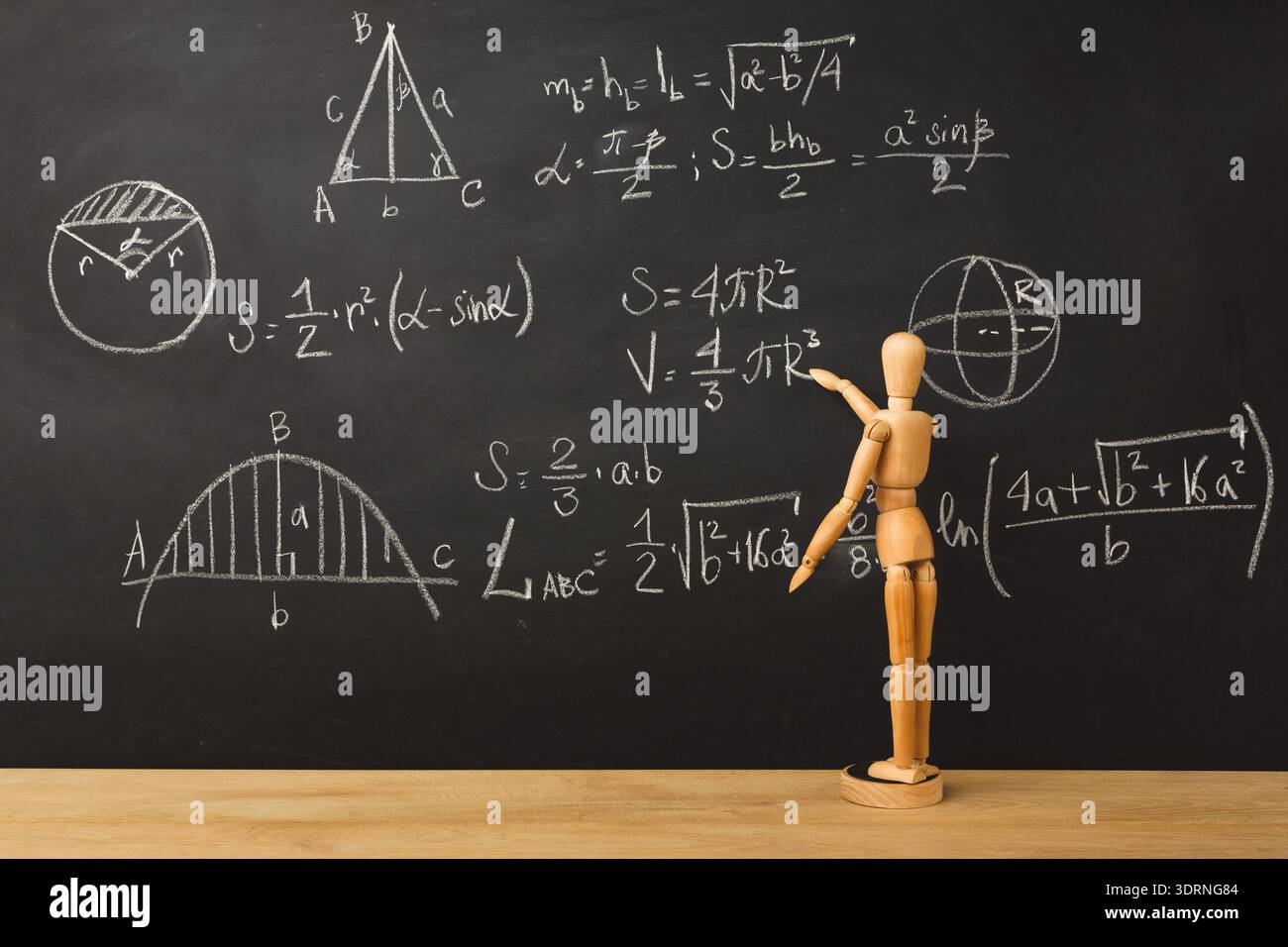Collage of Mathematical Concepts on a Blackboard With a Wooden Mannequin Pointing at Equations Stock Photo