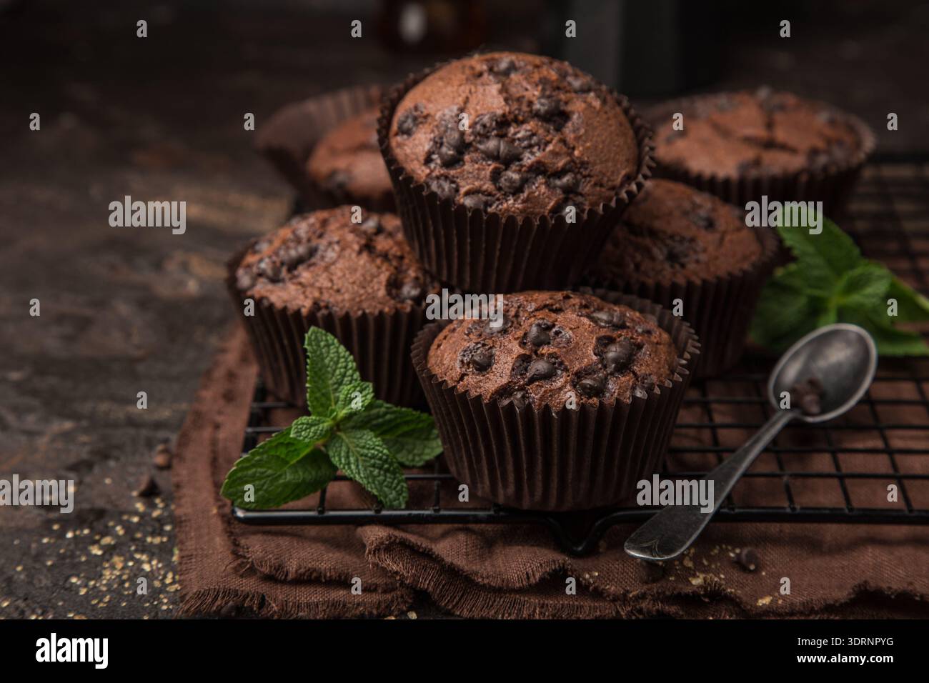 Delicious chocolate muffins on  dark background Stock Photo