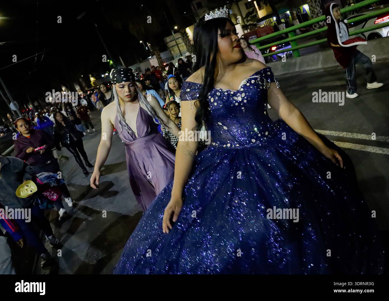 Holy Week Masks A woman dressed as a queen dances during the Carnival of Masks and ...