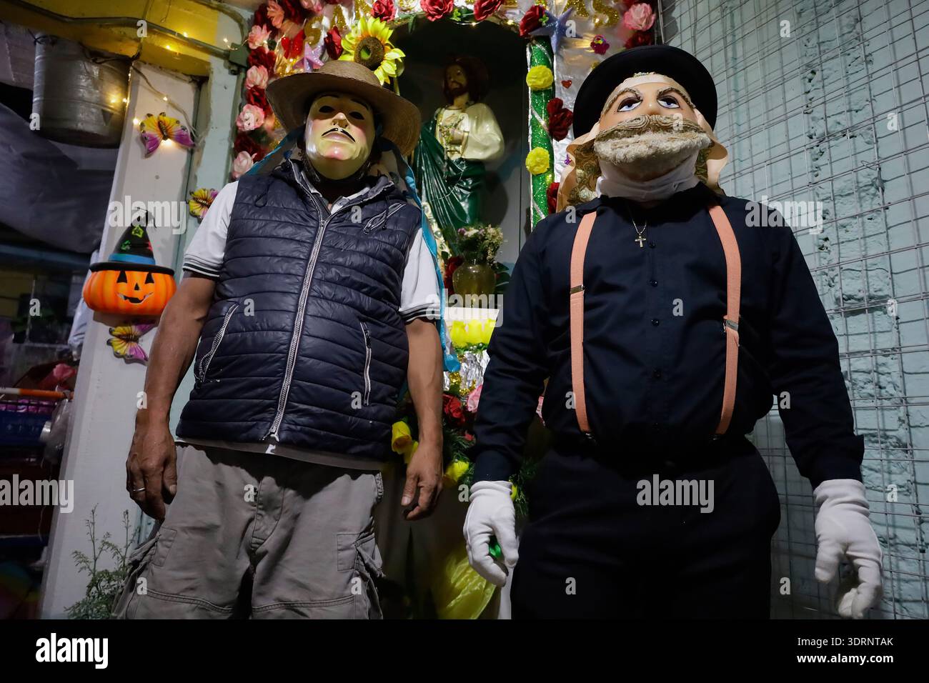 Holy Week Masks Masked men seen standing before an altar during the Carnival of Masks ...