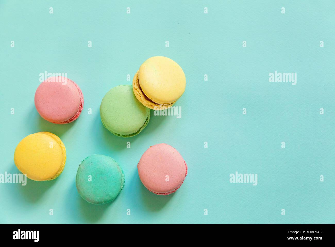 Colorful macaron on blue background Stock Photo