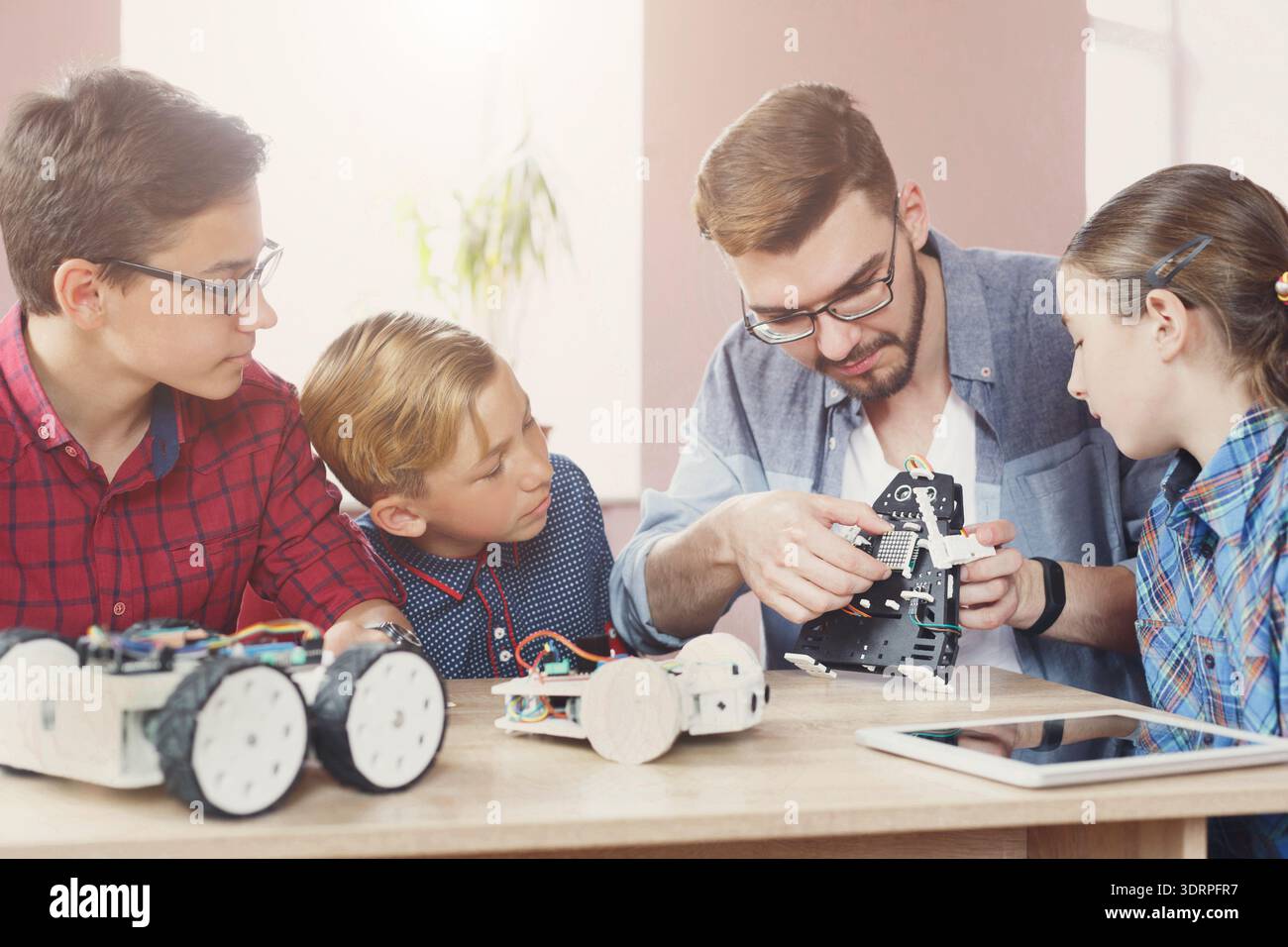 Students Learn About Robotics in Hands-On Workshop Stock Photo
