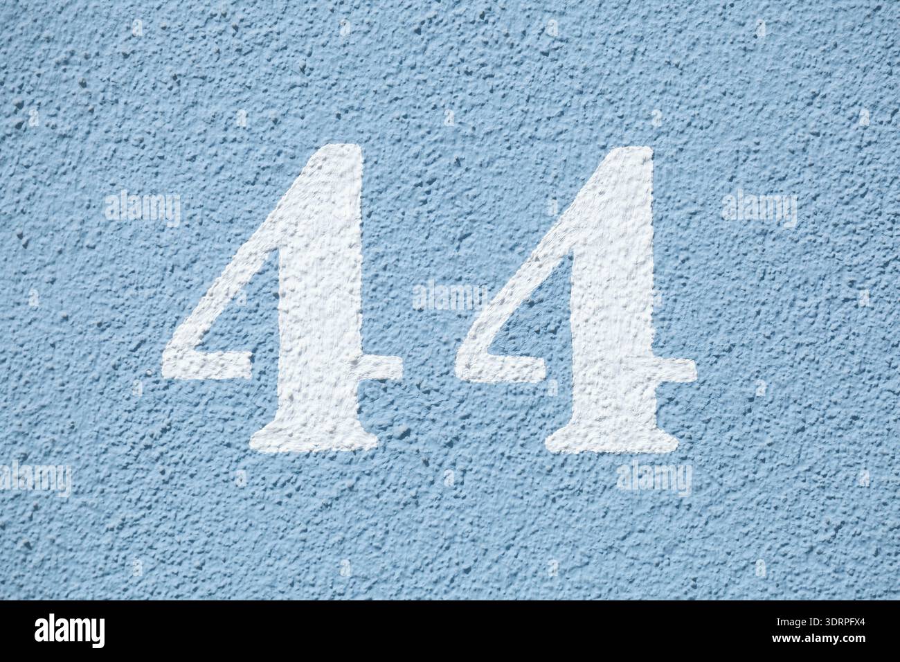 Number 44 on house wall Stock Photo - Alamy