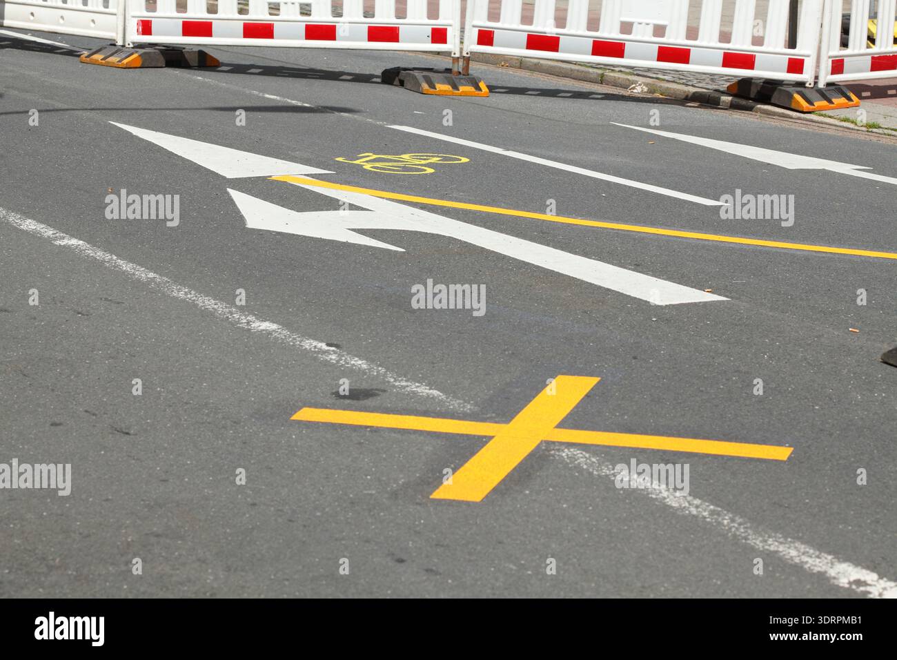 Road marking direction arrow, cycle path, diversion Stock Photo