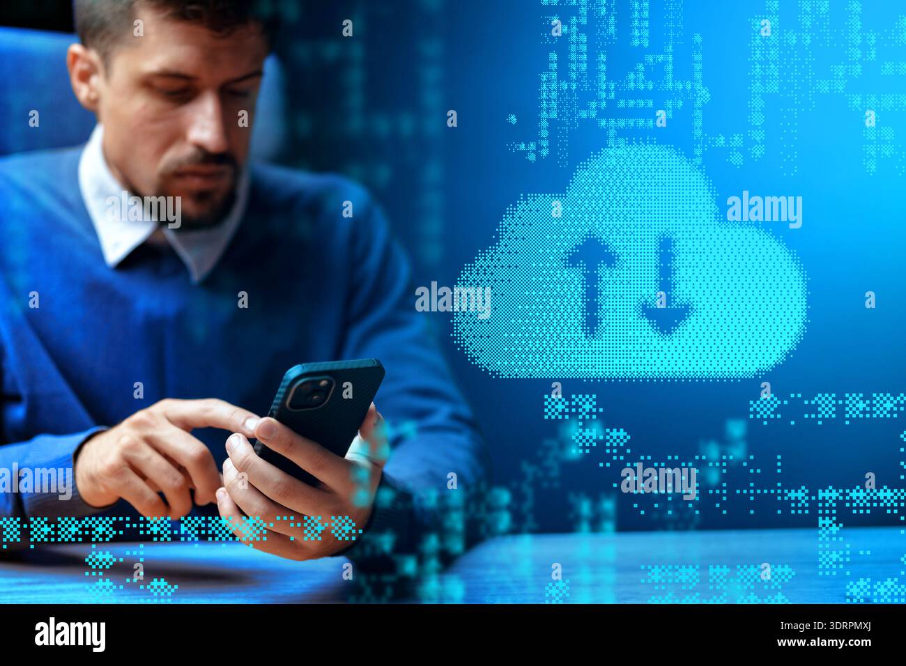 Man using smartphone to transfer data in digital workspace on a workday afternoon Stock Photo