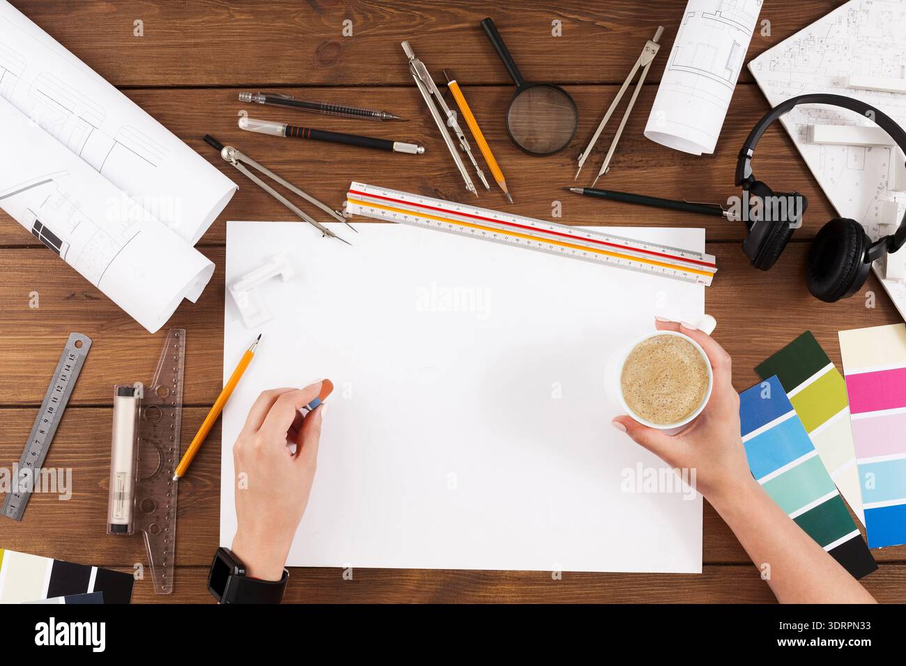 Creative Workspace for Design Projects Featuring Tools and Materials for Planning Stock Photo
