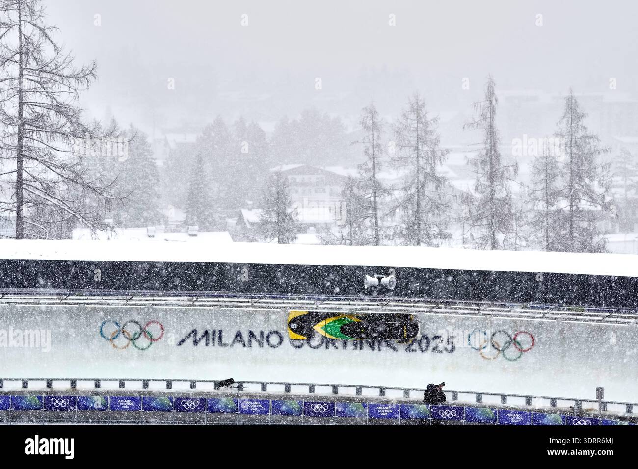 Jamaica's Shane Pitter, left, slides down the track during a four man ...