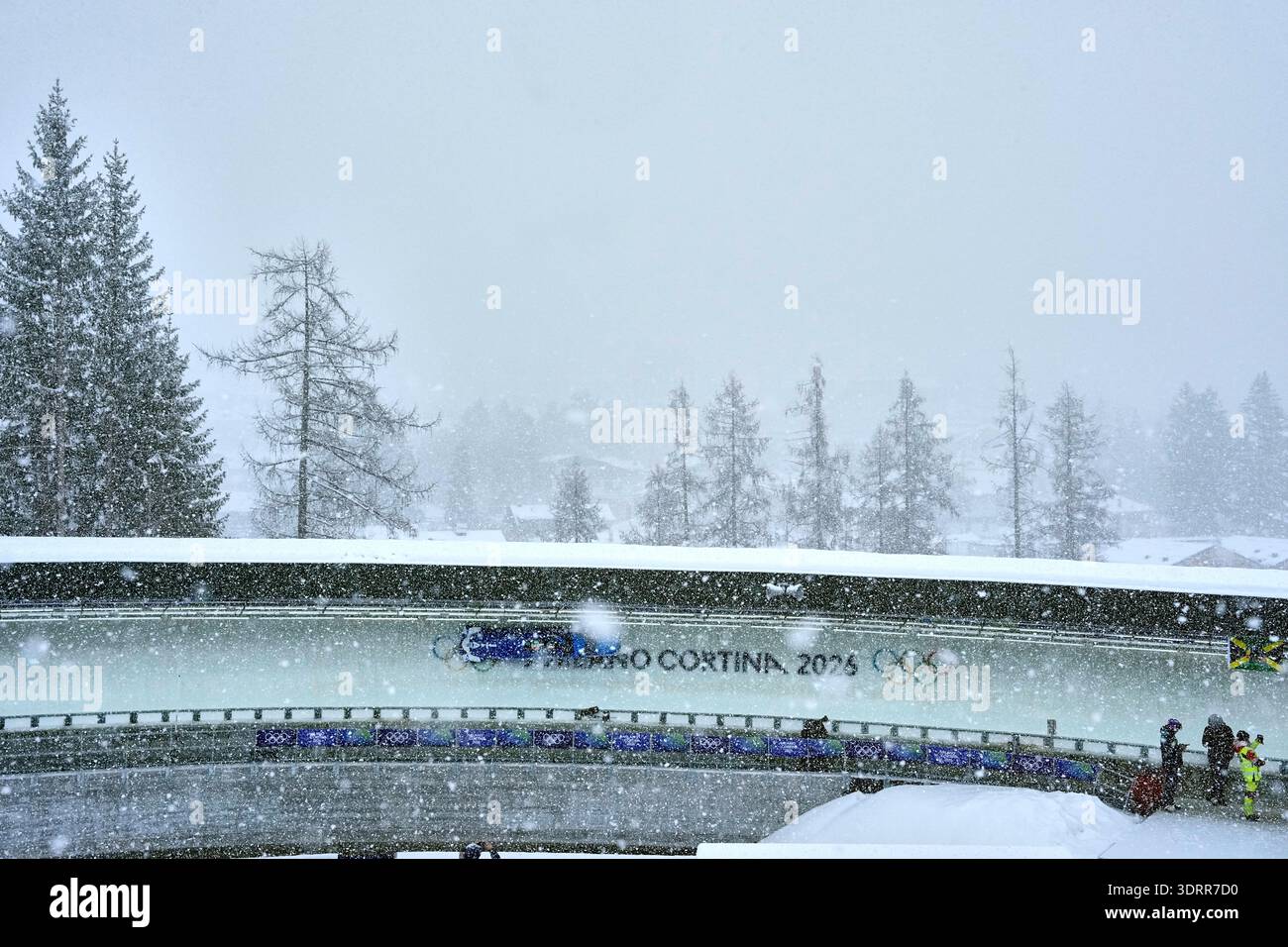 Italy's Patrick Baumgartner, left, slides down the track during a four ...