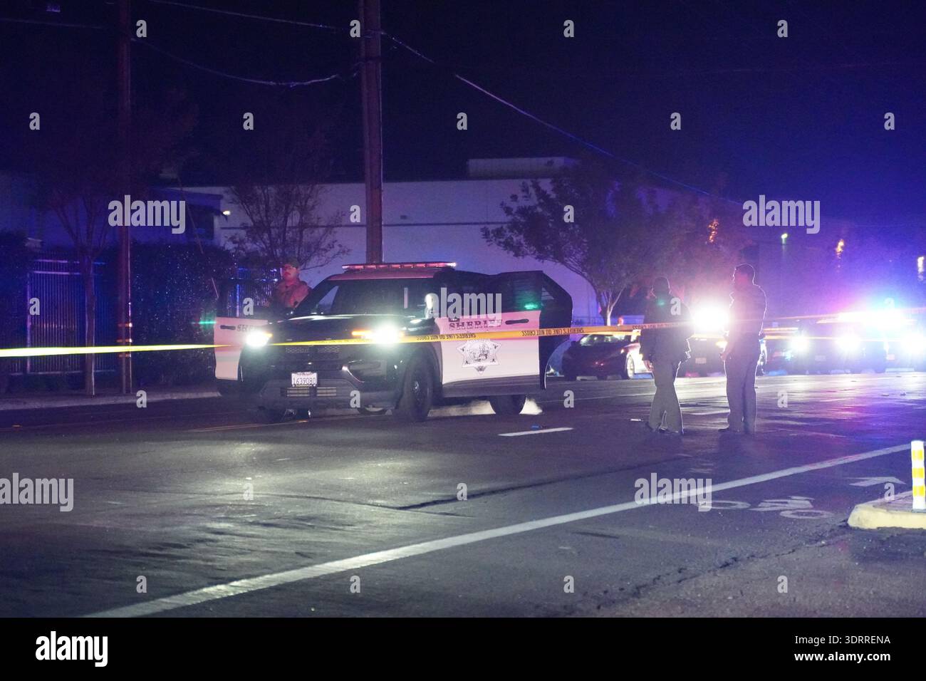 Police officers are on scene to investigate the fatal shooting and the ...