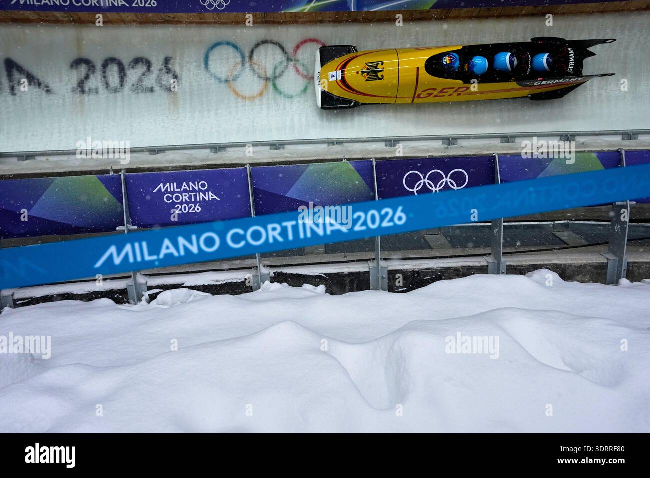 Germany's Adam Ammour, left, slides down the track during a four man ...