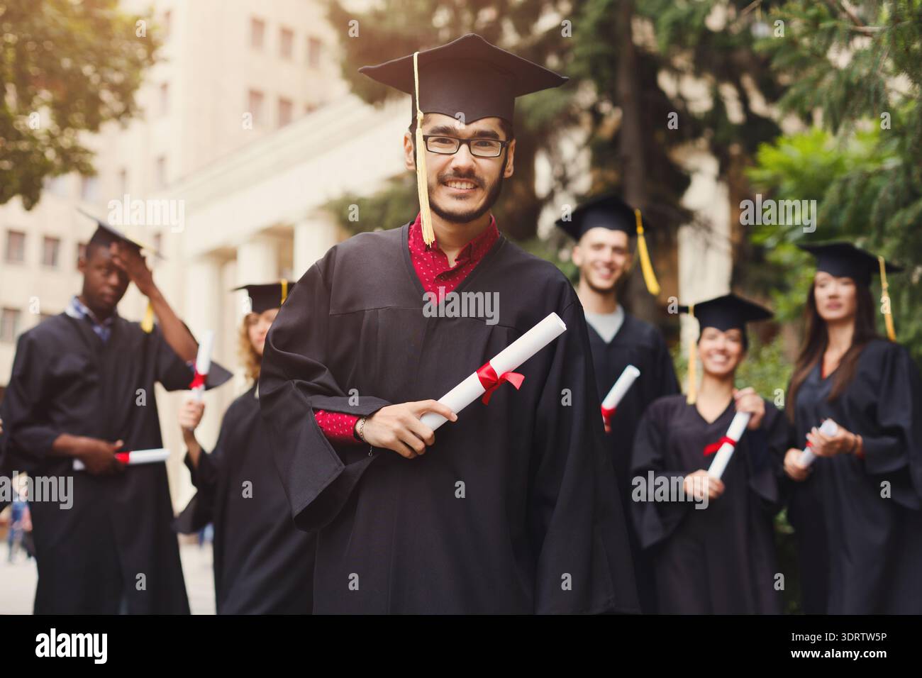 Graduation Ceremony Held Outdoors With Students Celebrating Their ...