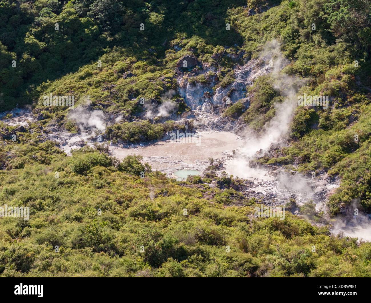 Aerial View Of A Geothermal Area With Steaming Vents And Mineral aerial-view-of-a-geothermal-area-with-steaming-vents-and-mineral