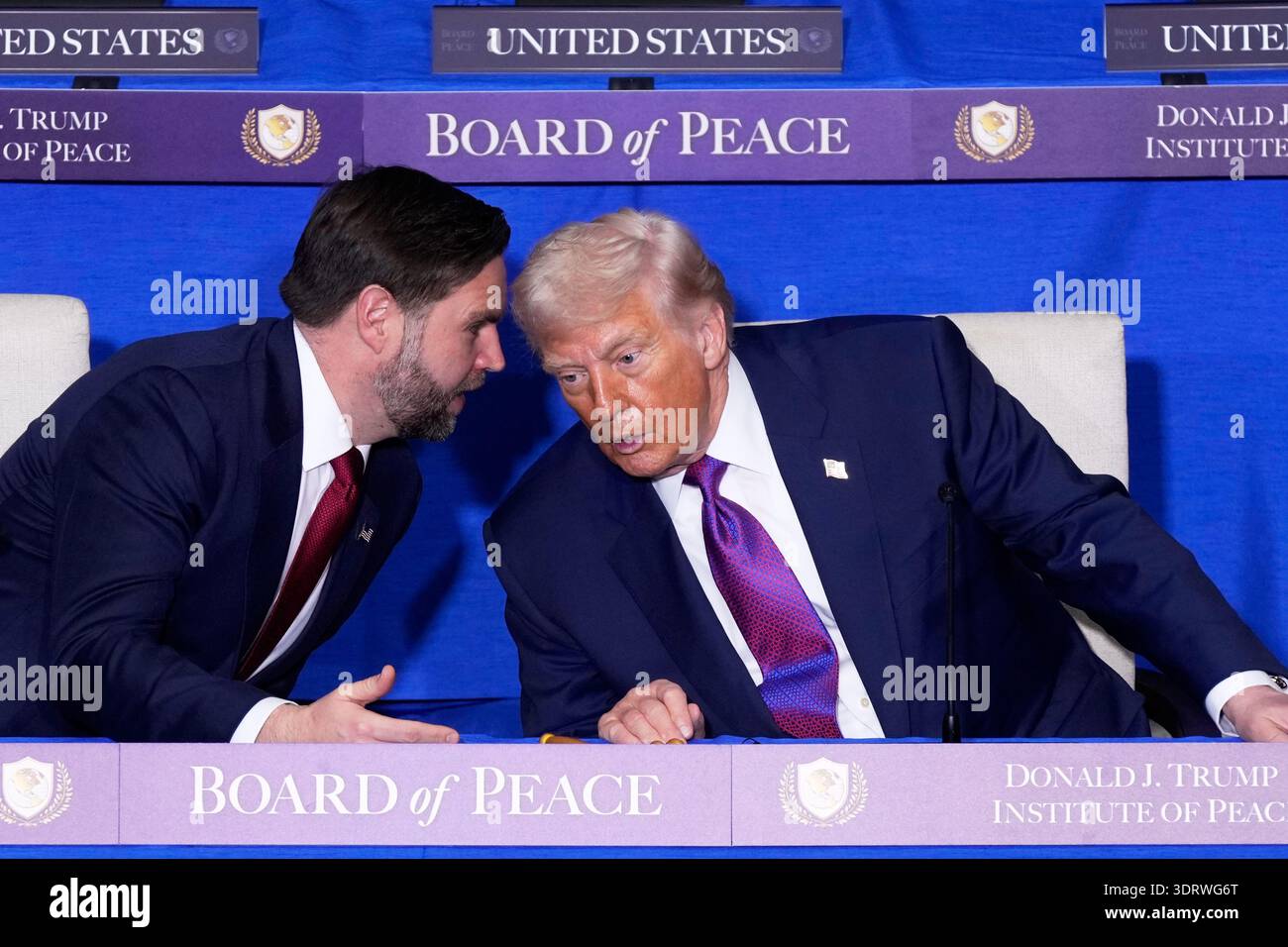 President Donald Trump speaks with Vice President JD Vance during a ...