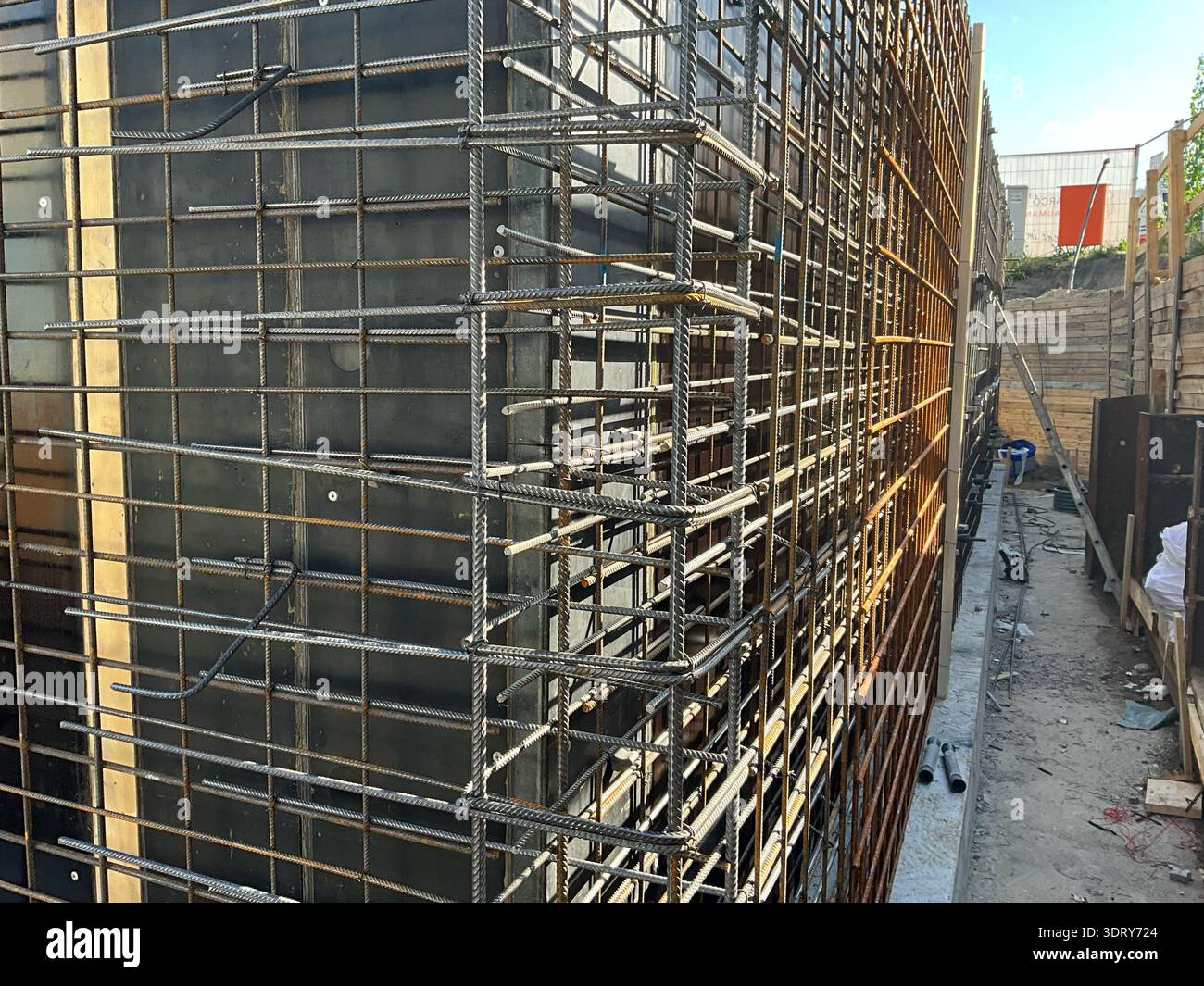 Wal Rabar Steel rebar reinforcement installed along formwork panels for a ...