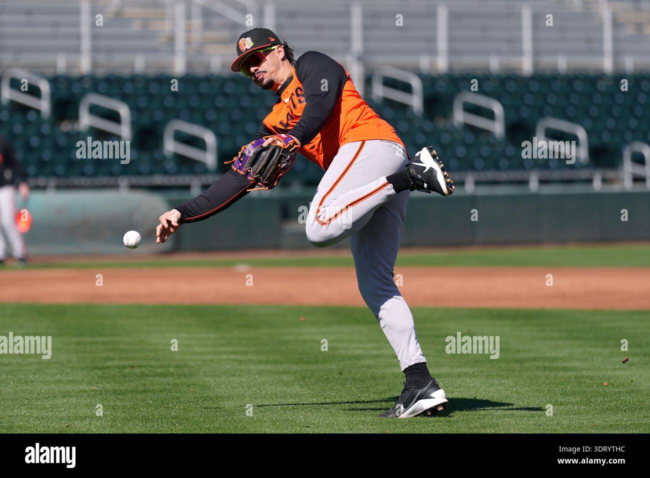 San Francisco Giants' Willy Adames throws to first base during workouts ...