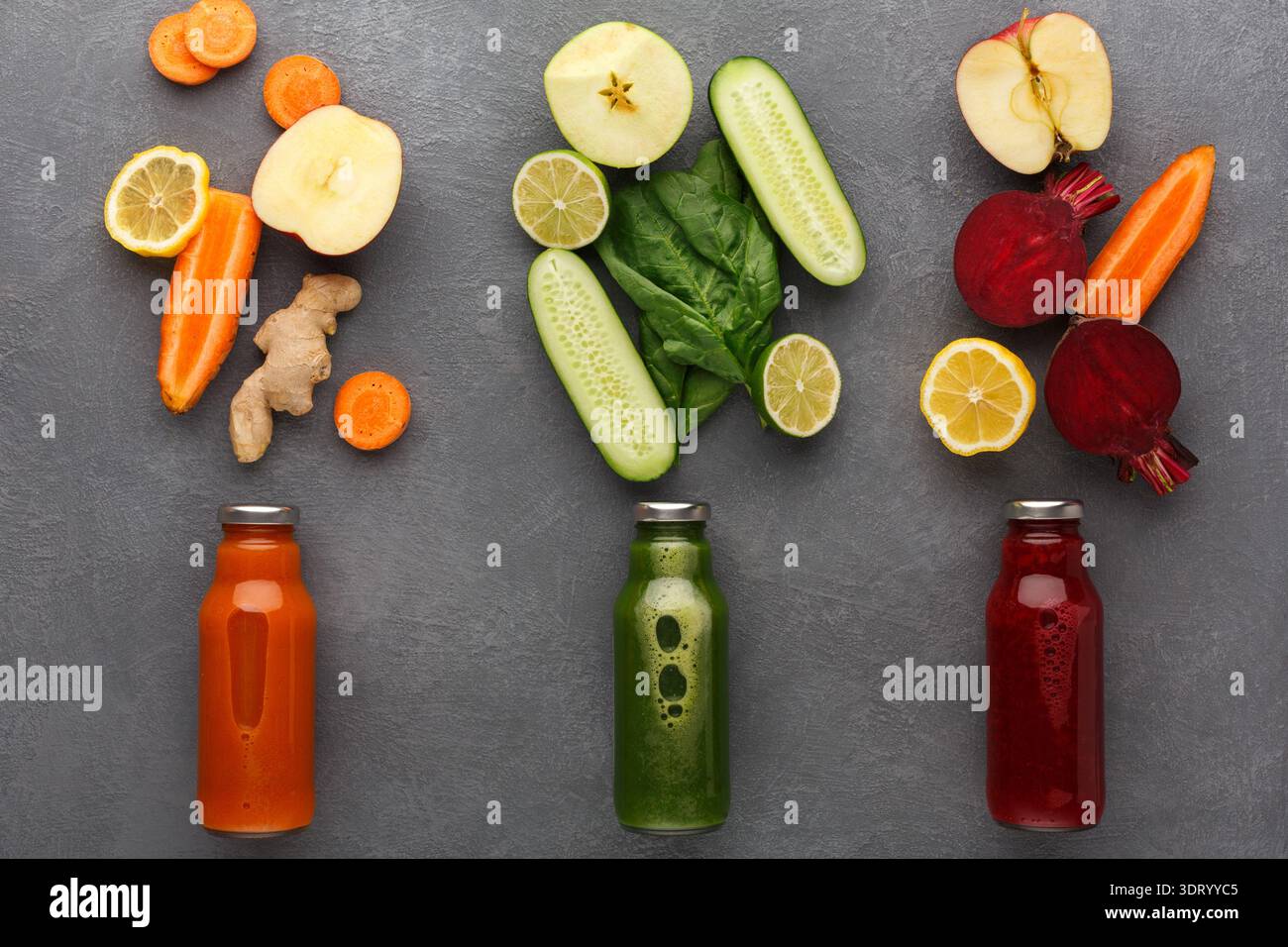 Healthy Juice Preparation With Fresh Ingredients on Gray Surface Stock Photo