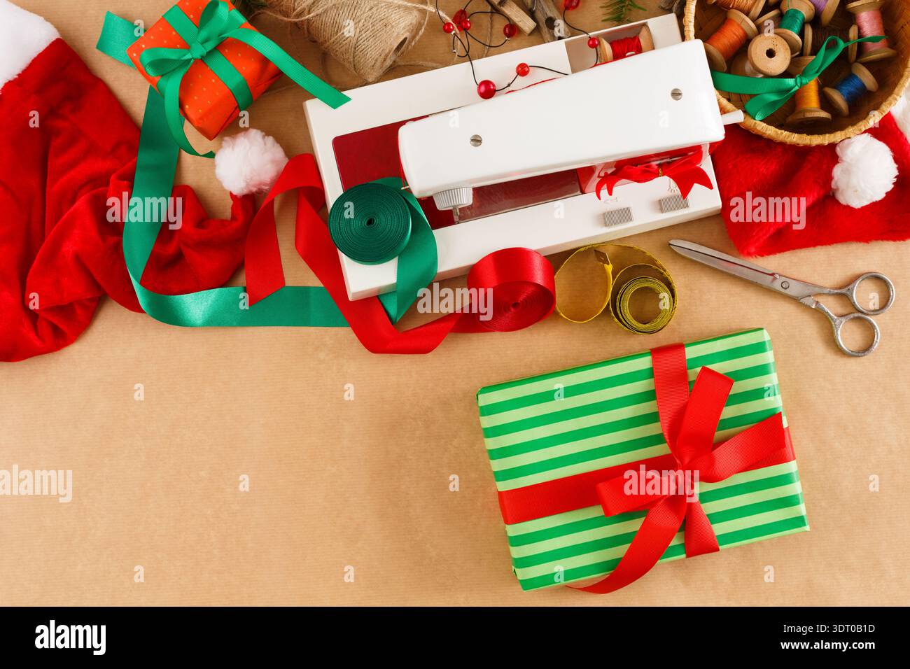 Holiday Gift Wrapping Collection With Tools and Decorations on a Table Stock Photo