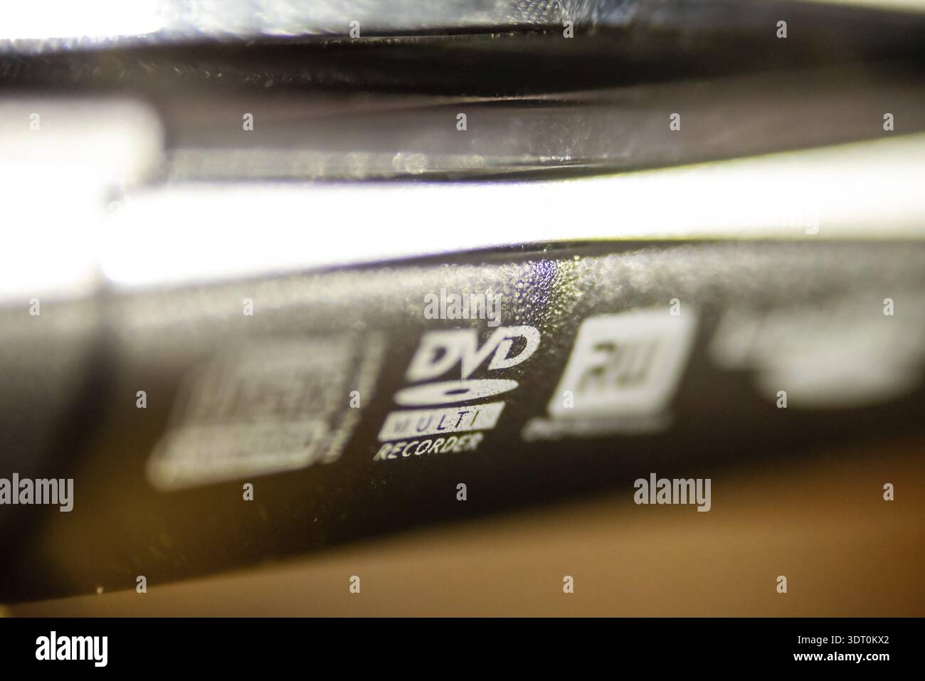 Dvd cd disk drive labels on laptop computer Stock Photo
