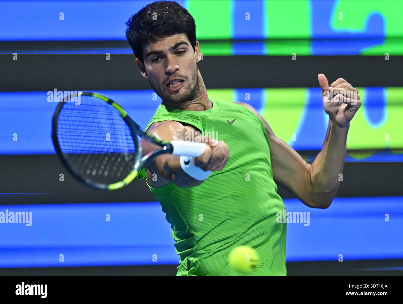 Doha, Qatar. 19th Feb, 2026. Carlos Alcaraz of Spain hits a return ...