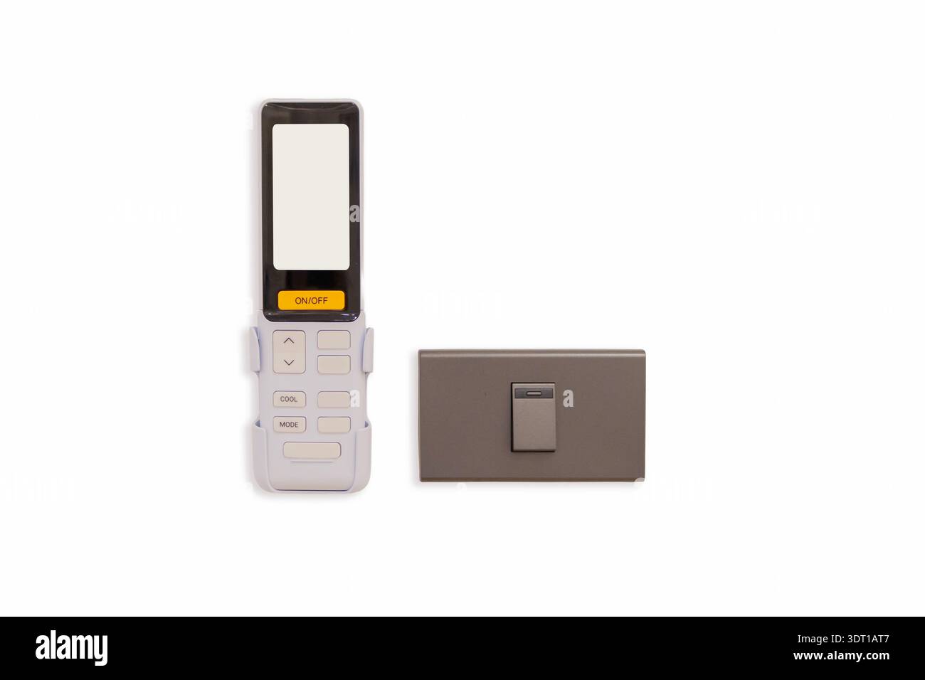 An air conditioner remote control with light switch setting on the wall. Close-up of an air conditioner remote with light switch, isolated on white , Stock Photo