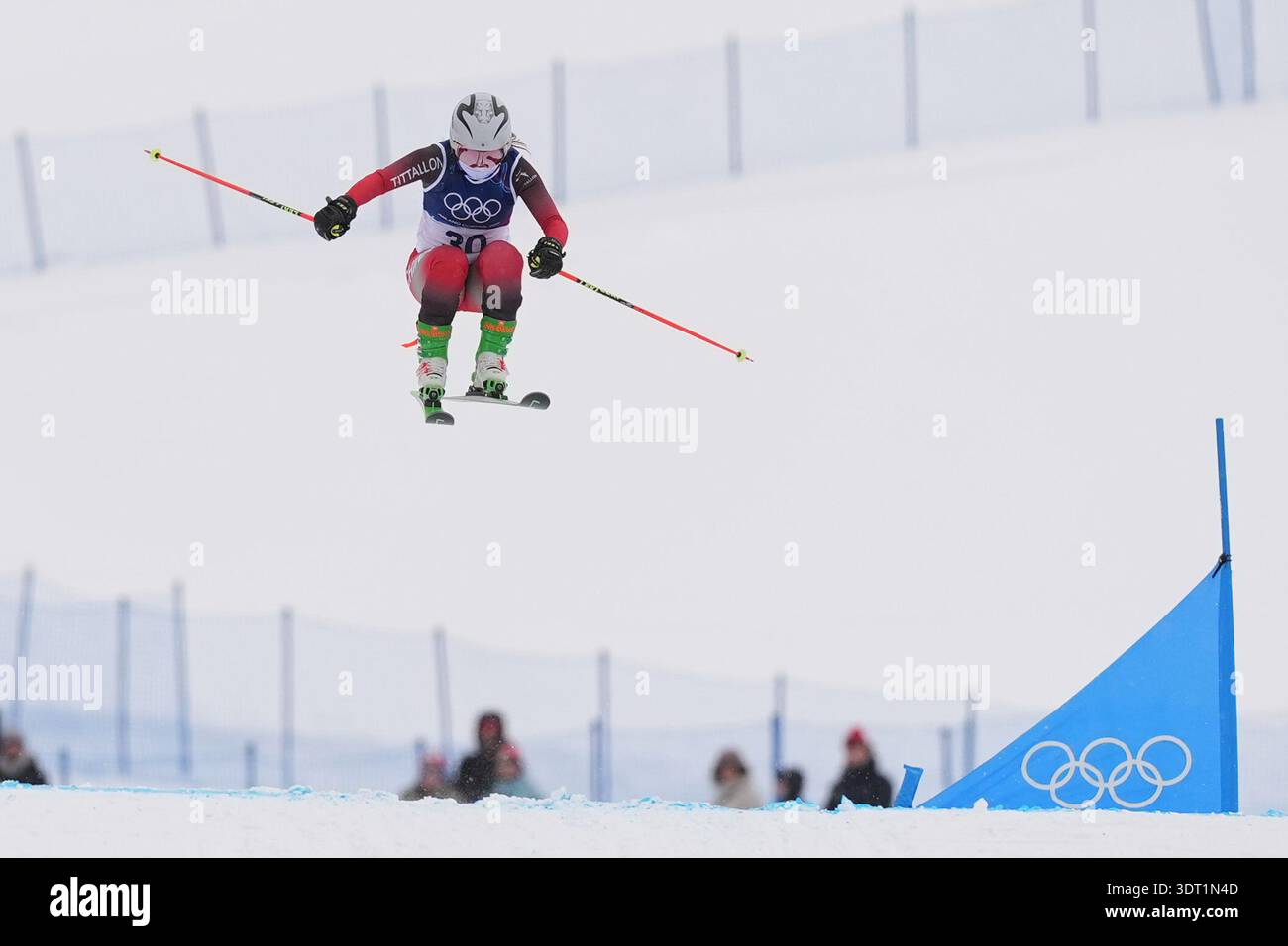 China's Xuelian Zhang (30) competes during the women's ski cross ...