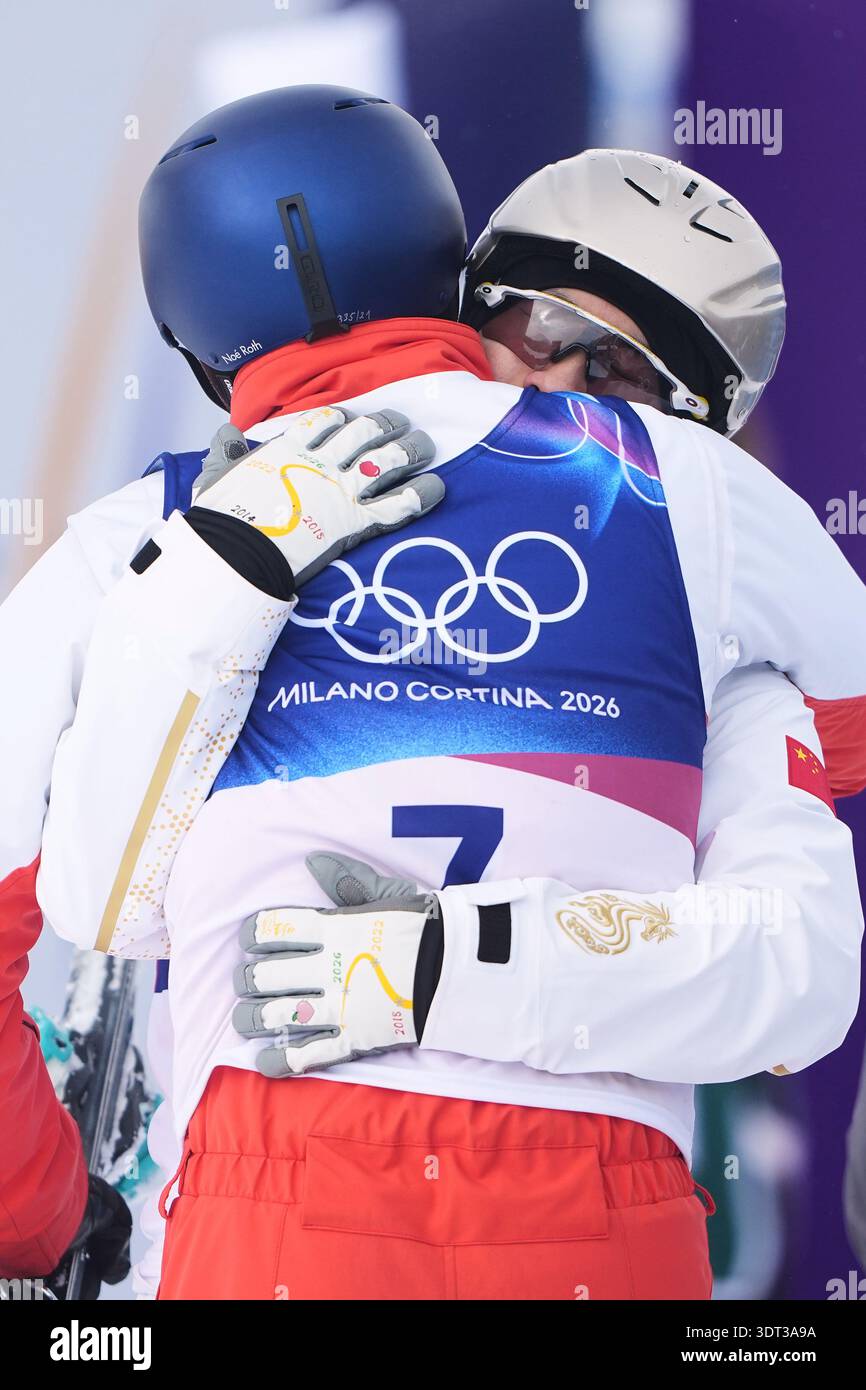 Noe Roth Designer Switzerland's Noe Roth (7) hugs China's Wang Xindi during the men's ...