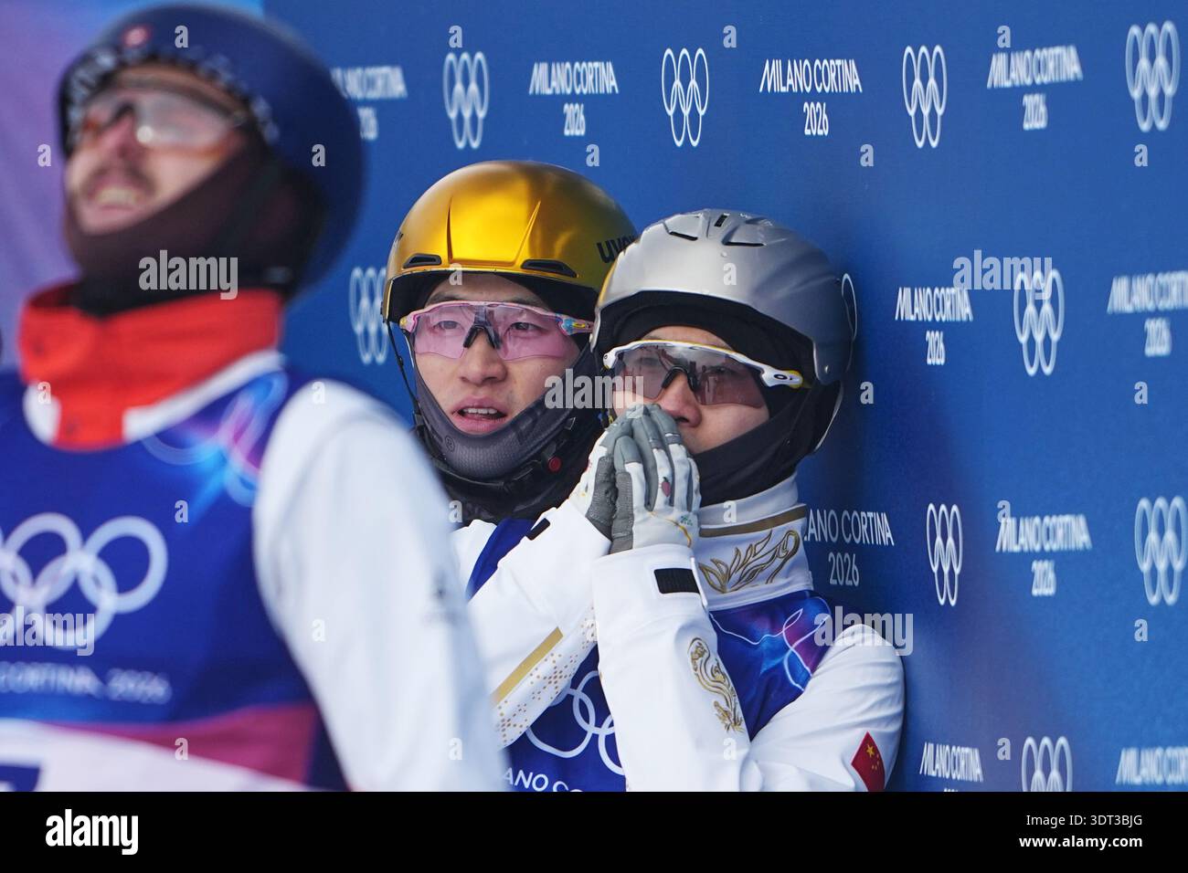 Noe Roth Designer China's Wang Xindi, right, waits for Switzerland's Noe Roth's score ...