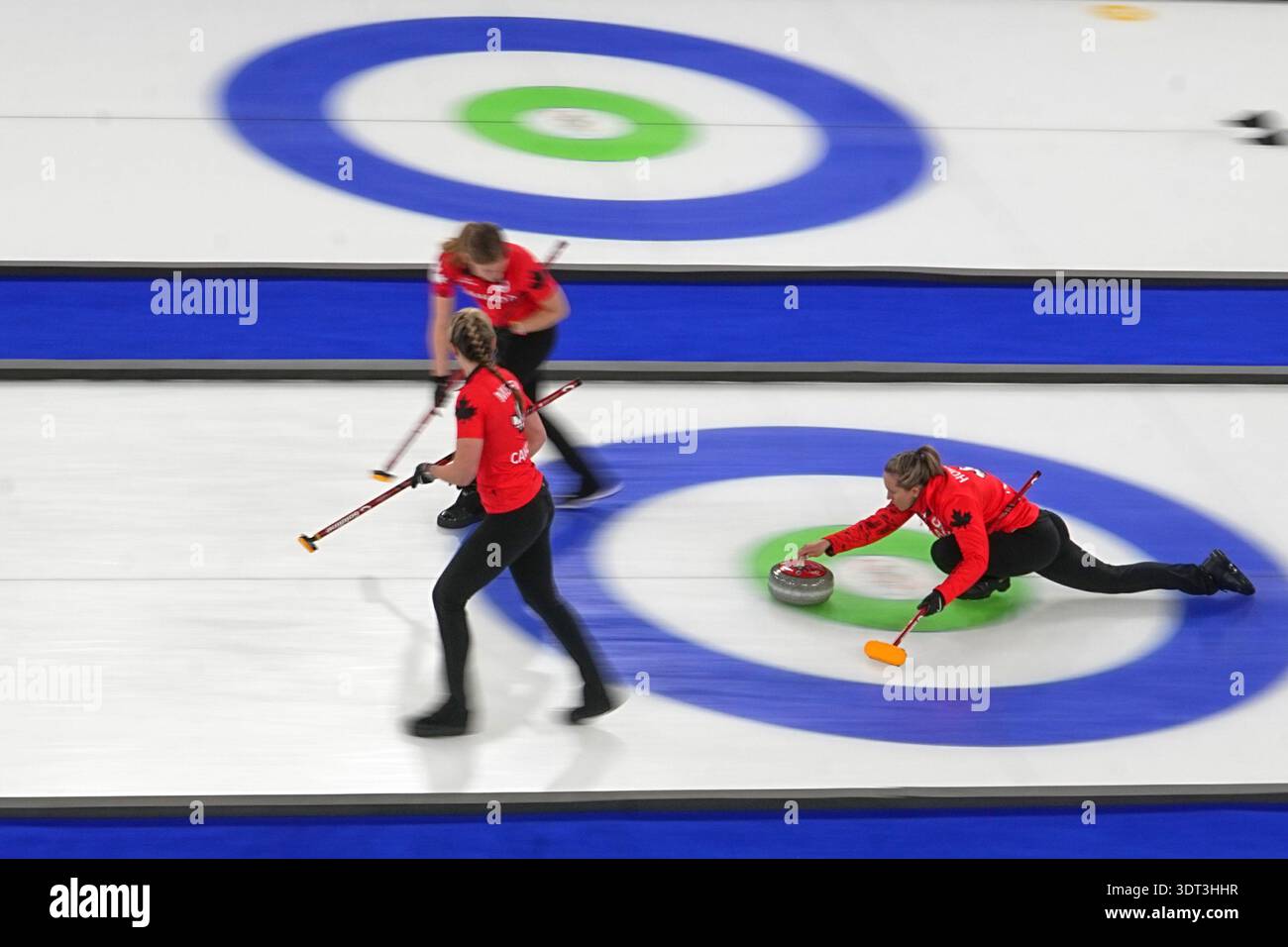 Canada's Rachel Homan throws the stone during a women's curling ...