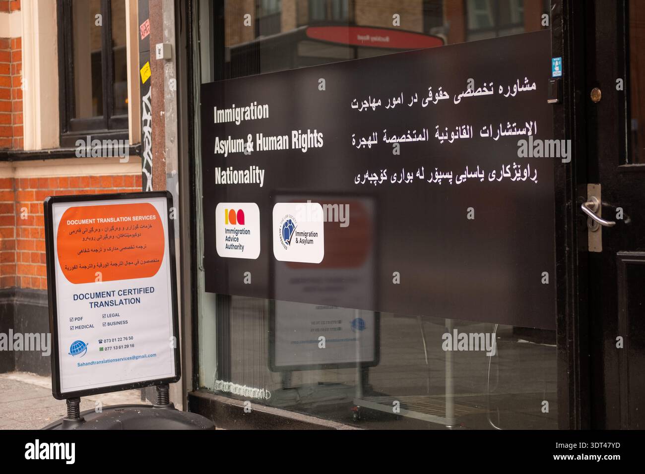 LONDON - 8 DECEMBER 2025: Kilburn High Road NW6 – Multilingual Immigration Advice Office, Asylum Human Rights Consultancy Sign, Multicultural London Stock Photo