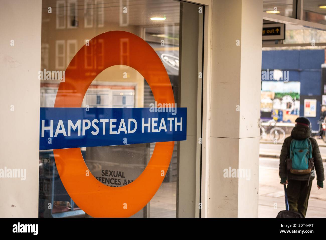 LONDON - DECEMBER 15, 2025: Hampstead Heath Overground station roundel entrance sign Mildmay line Stock Photo
