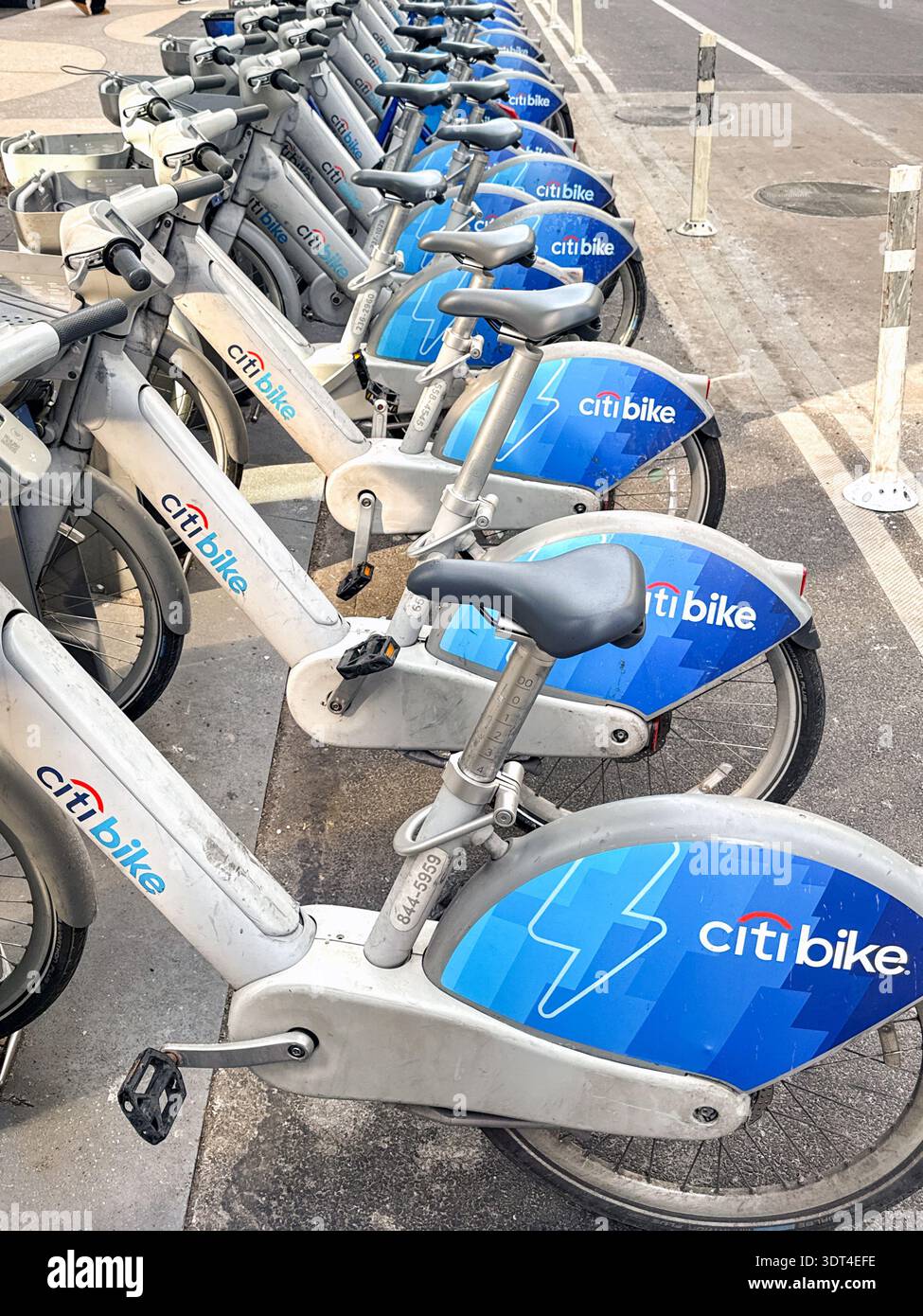 New York, USA - 23 January 2026:  Row of bicycles sponsored by Cit Bike in their parking stations in Manhattan. The bikes can be rented - Smartphone Captured Stock Image