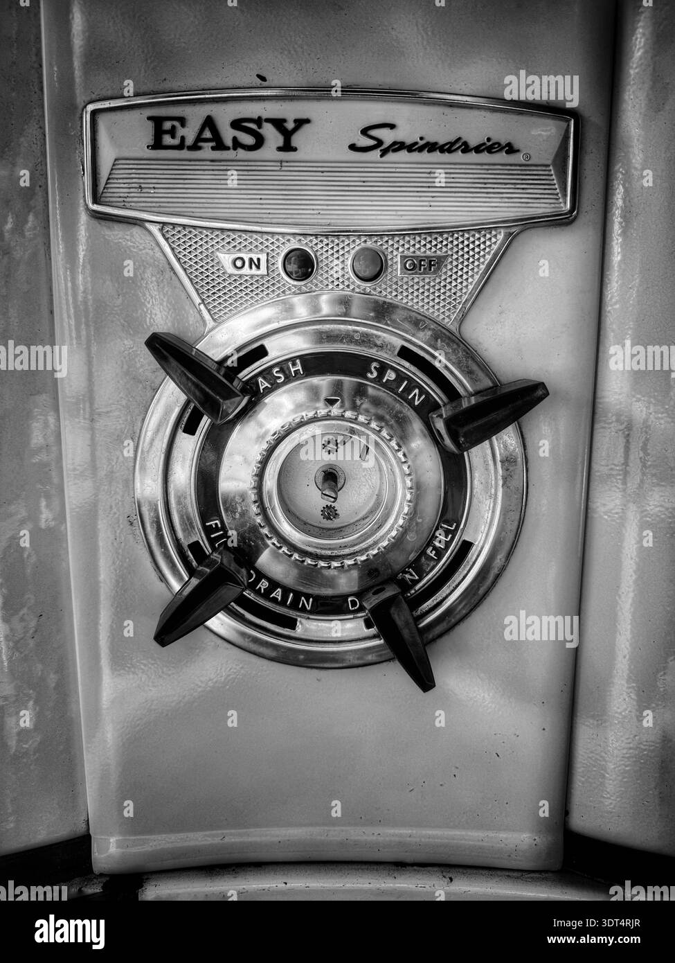 Close‑up view of the control panel on an Easy Spindrier vintage washing machine, showing rotary wash and spin controls with on/off buttons on a mid‑20 - Smartphone Captured Stock Image