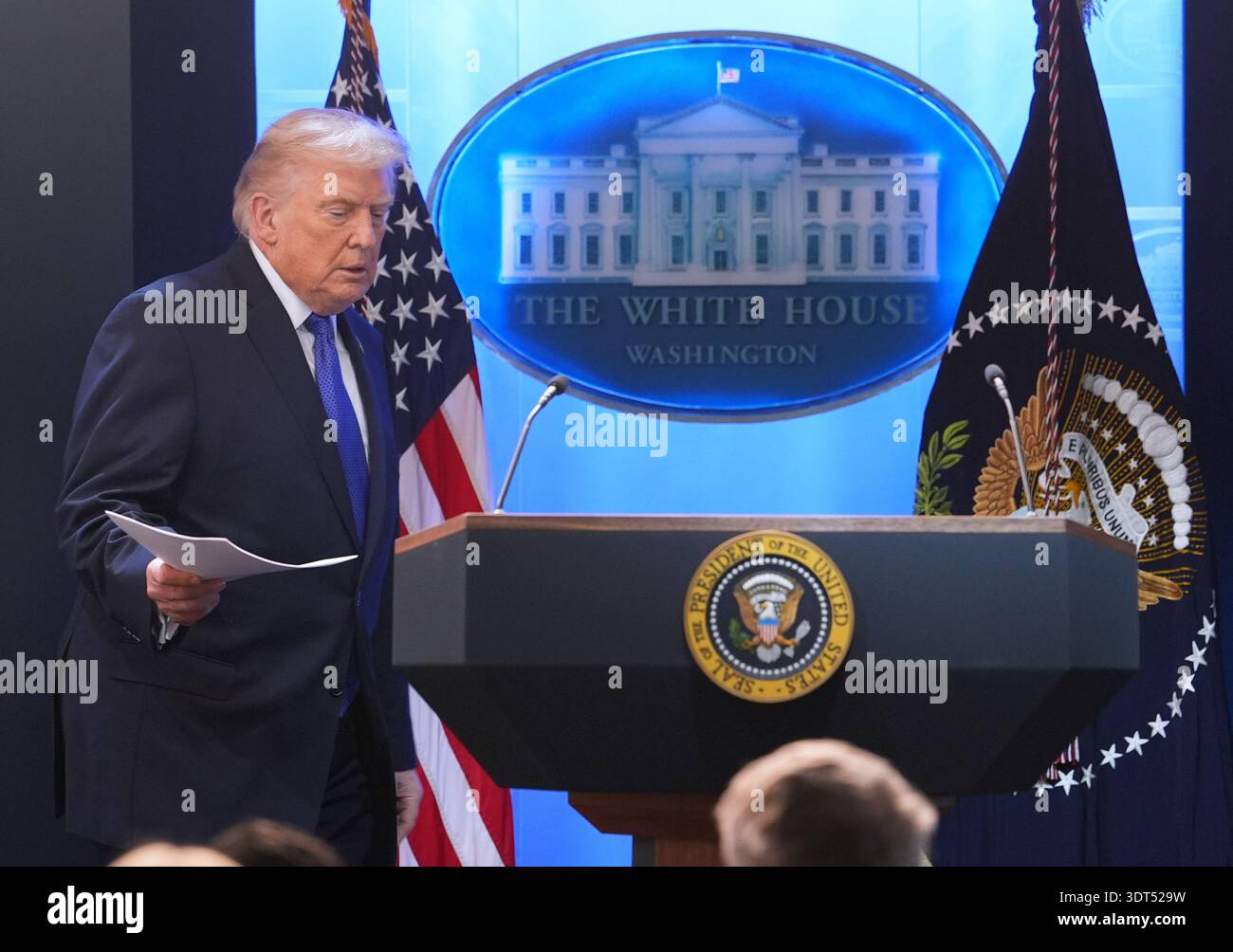 President Donald Trump arrives for a press briefing at the White House ...