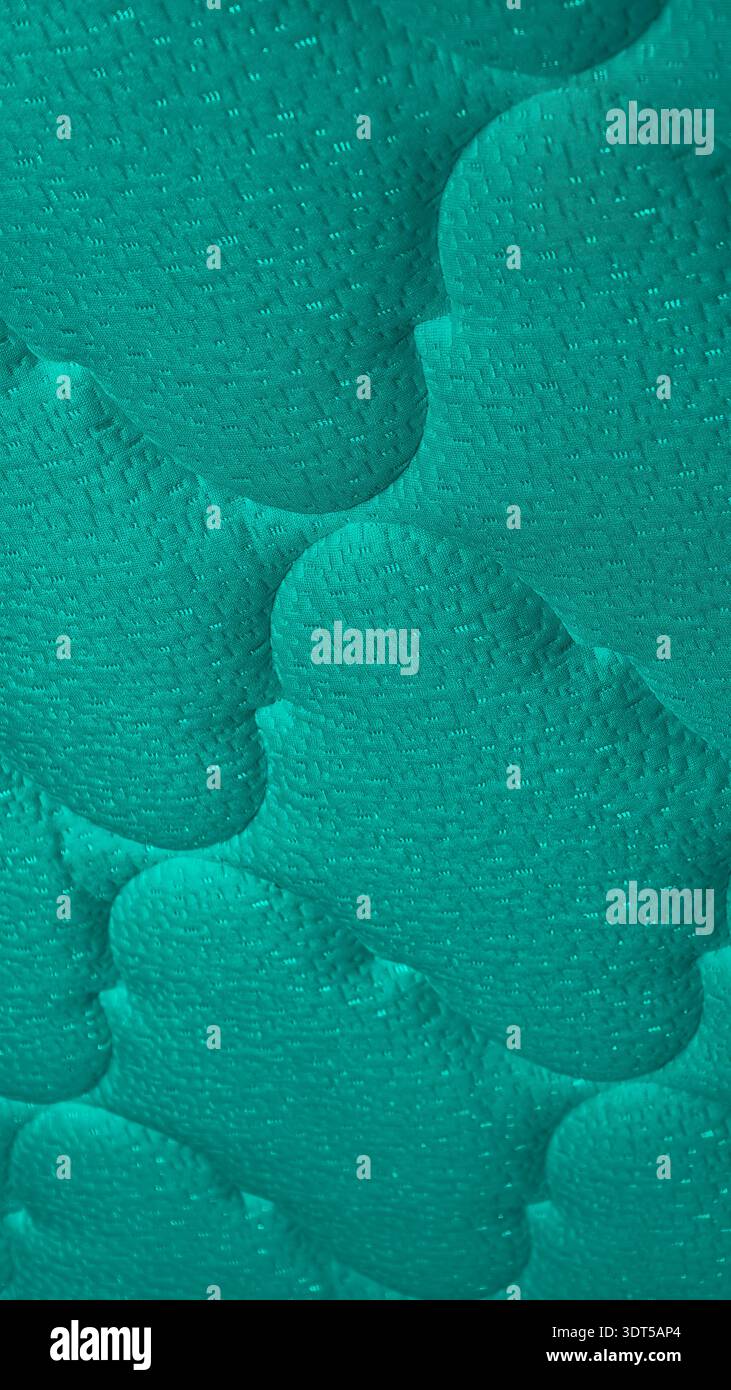 Turquoise flowing forms create a serene 8K wallpaper vertical background with generous copy space for a refined modern phone screen. Stock Photo