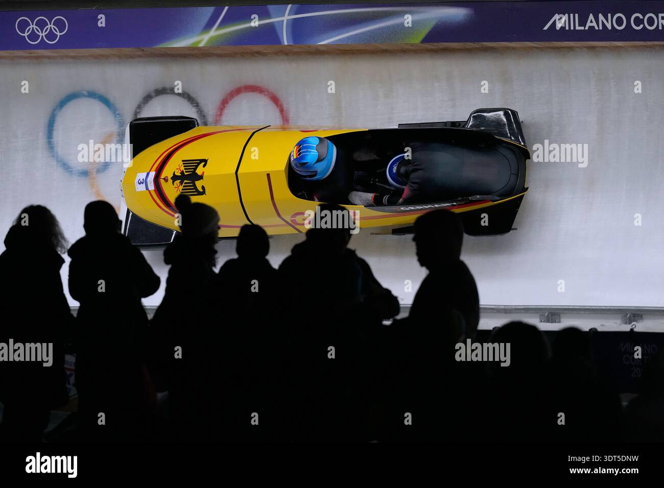 Germany's Kim Kalicki, left, and Talea Prepens slide down the track ...