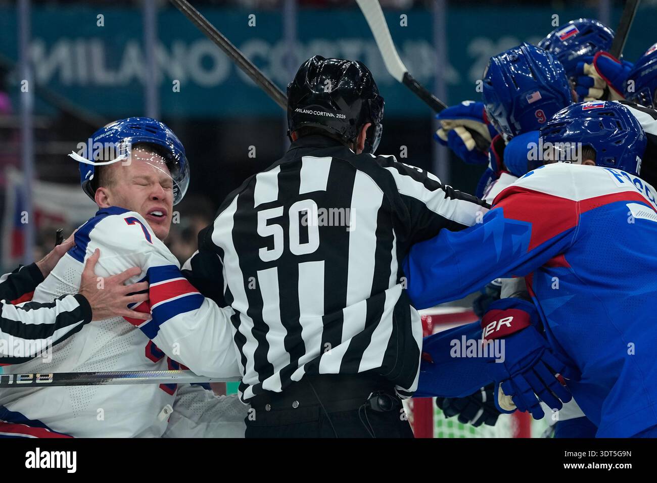 United States' Brady Tkachuk (7) scuffles with Slovakia's Martin ...