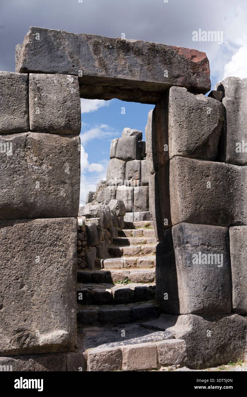 Tourists visit the ruins of Sacsayhuaman, an ancient Incan citadel near ...