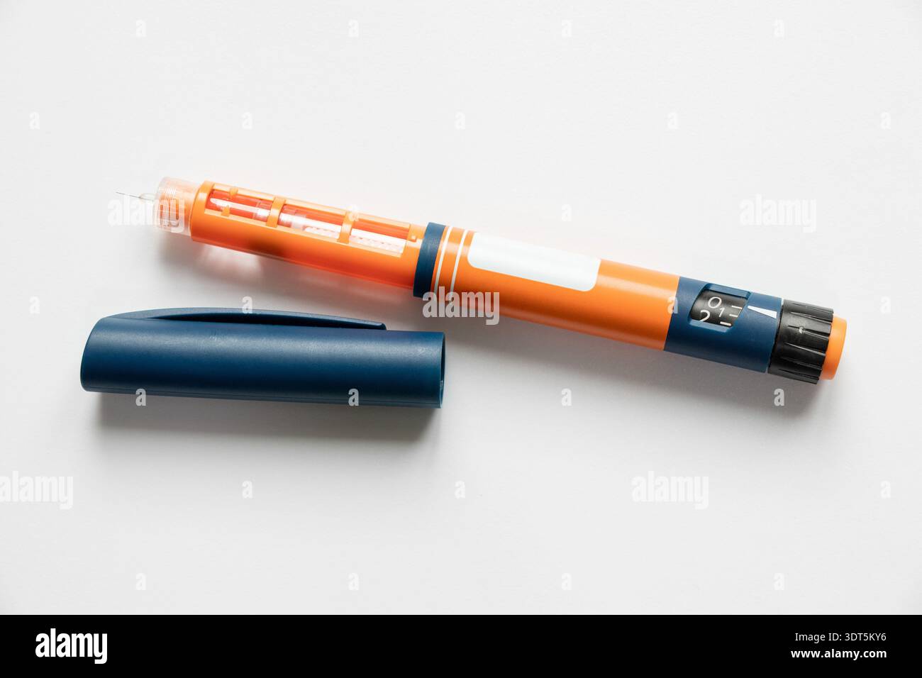 Insulin Injection Device Inpen An insulin pen lying on a white background. A medical device for ...